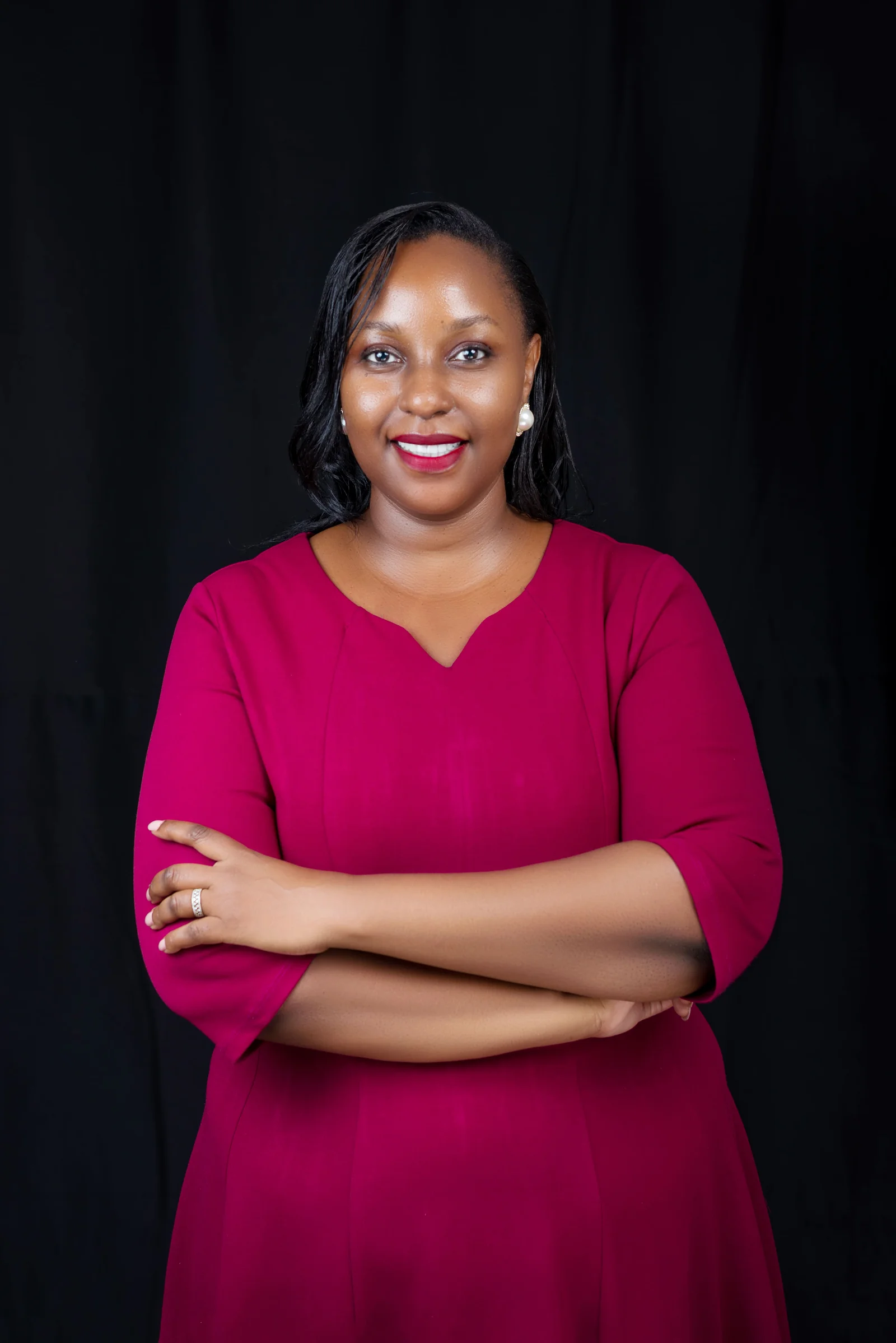Lois Asiimwe celebrating restored health and vibrant vitality after Gastric Bypass